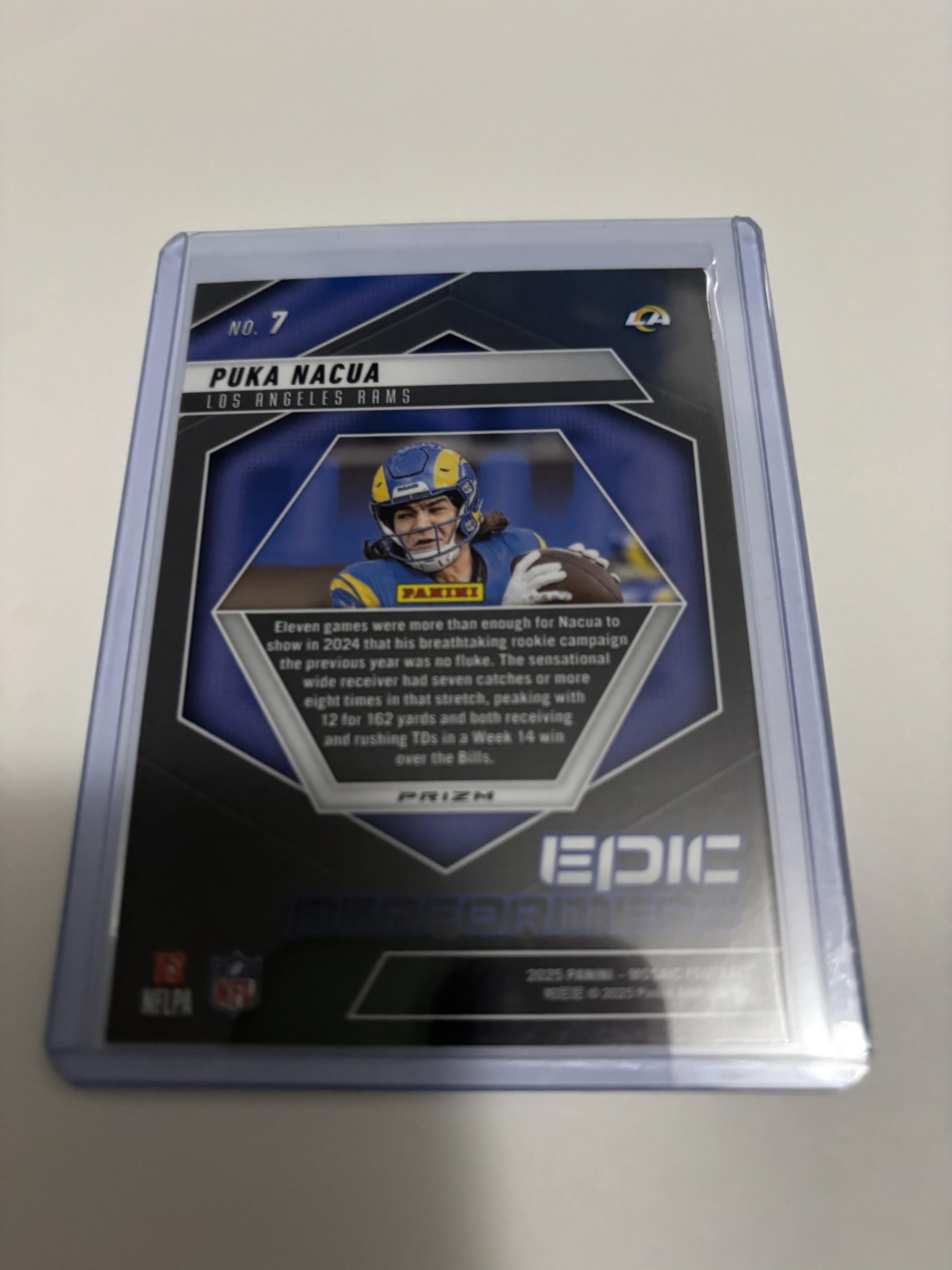 2025 Panini Mosaic #7 Puka Nacua Epic Performers Mosaic Orange Fluorescent
