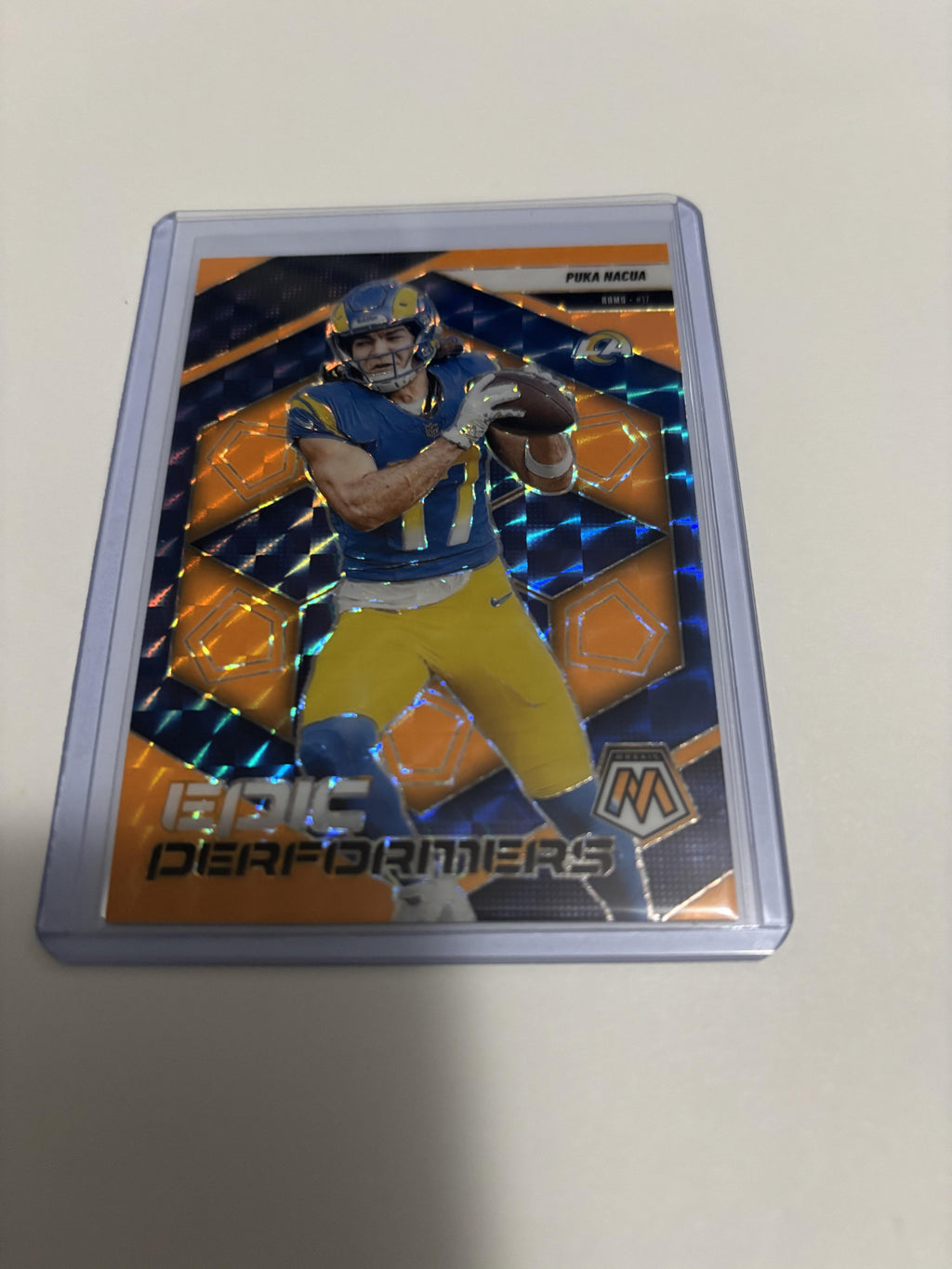 2025 Panini Mosaic #7 Puka Nacua Epic Performers Mosaic Orange Fluorescent