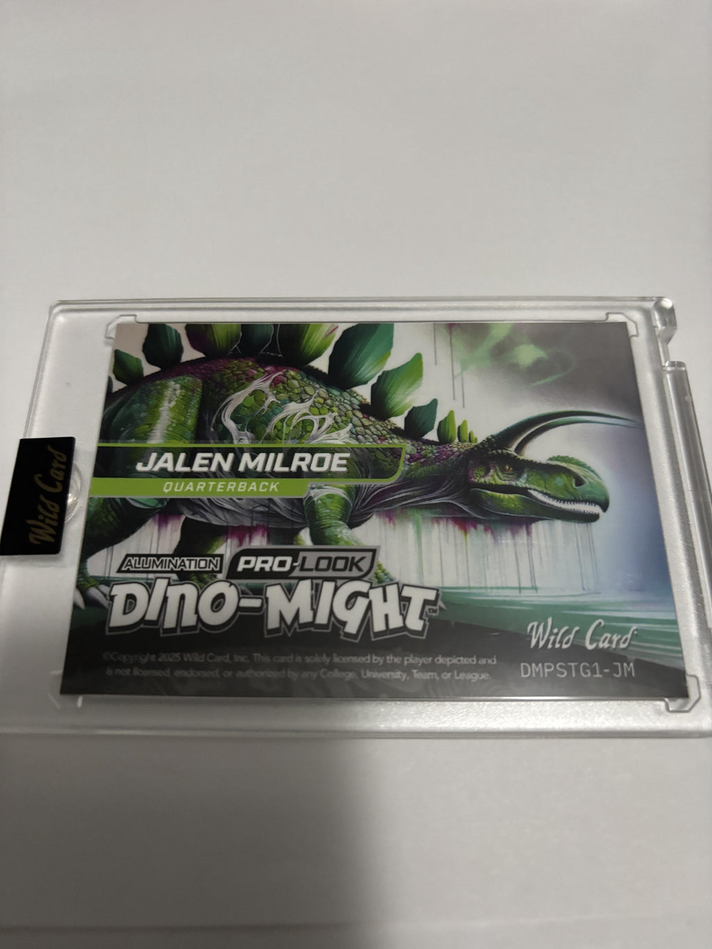 2025 Wild Card Alumination Dino-Might Jalen Milroe Green Foil /10 SP Stegosaurus