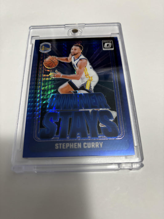 2023-24 Donruss Optic Winner Stays Stephen Curry Blue Prizm /175 Warriors #16