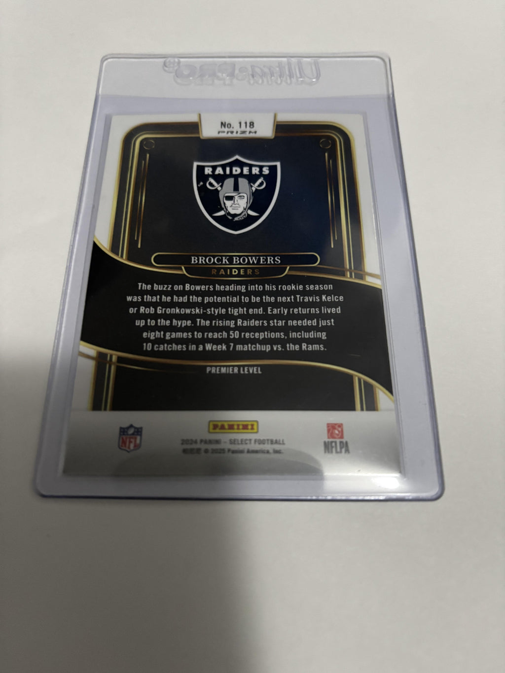 2024 Panini Select Brock Bowers RC #118 Premier Level Green Yellow Shock Prizm