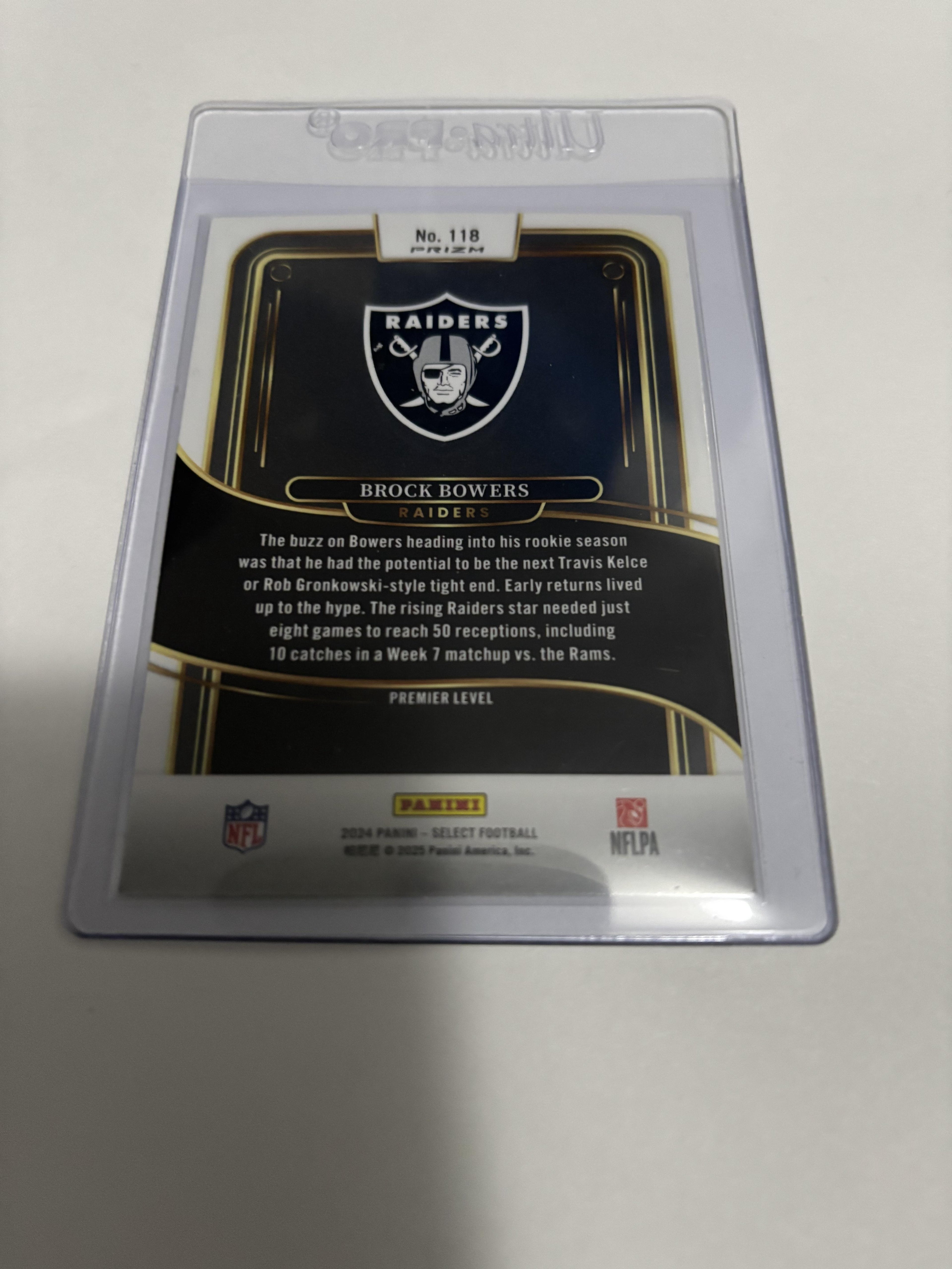 2024 Panini Select Brock Bowers RC #118 Premier Level Green Yellow Shock Prizm