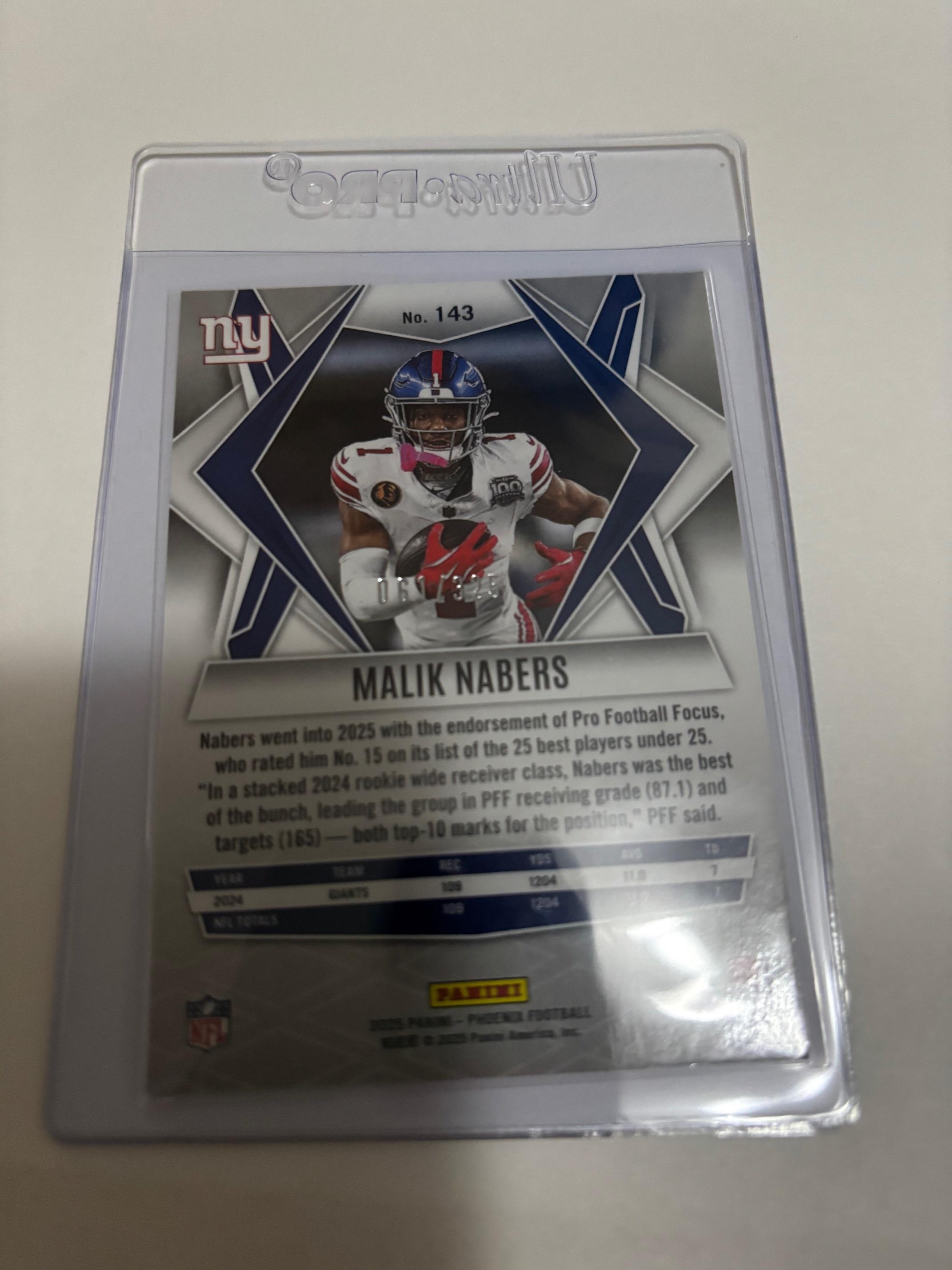 2025 Panini Phoenix Malik Nabers Light Blue Lava RC /325 #143 Giants Rookie