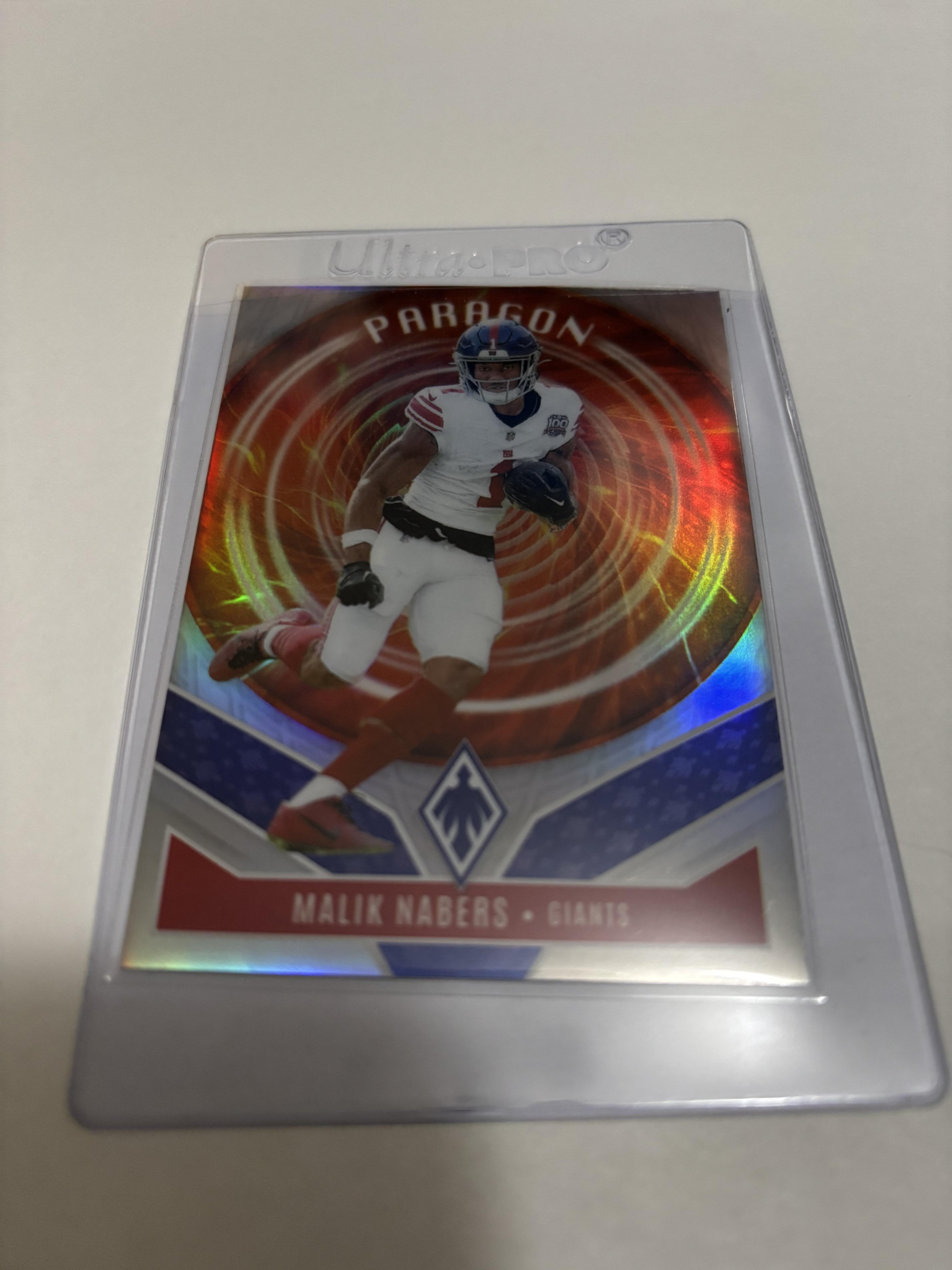 2025 Panini Phoenix Malik Nabers Light Blue Lava RC /325 #143 Giants Rookie