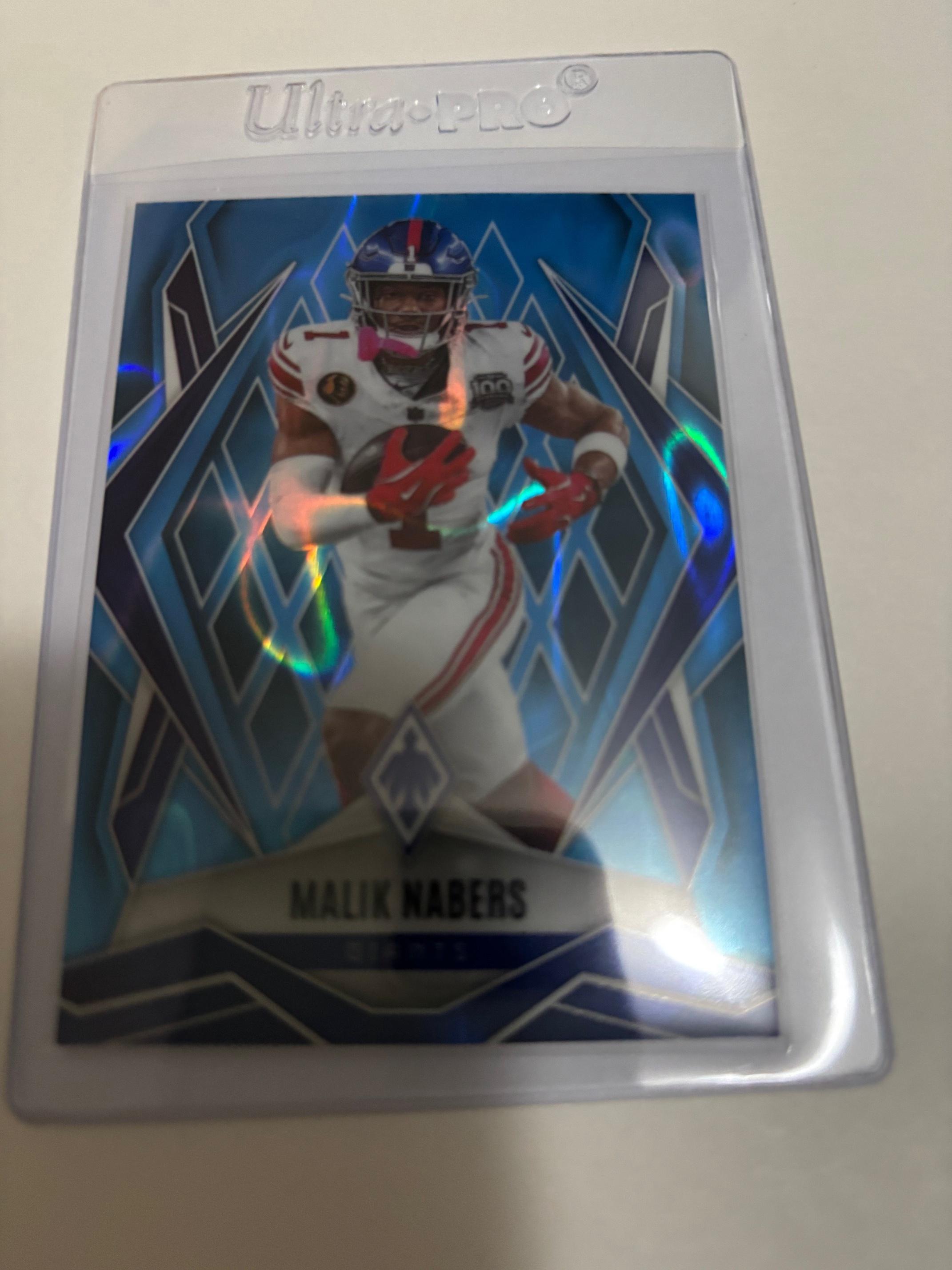 2025 Panini Phoenix Malik Nabers Light Blue Lava RC /325 #143 Giants Rookie