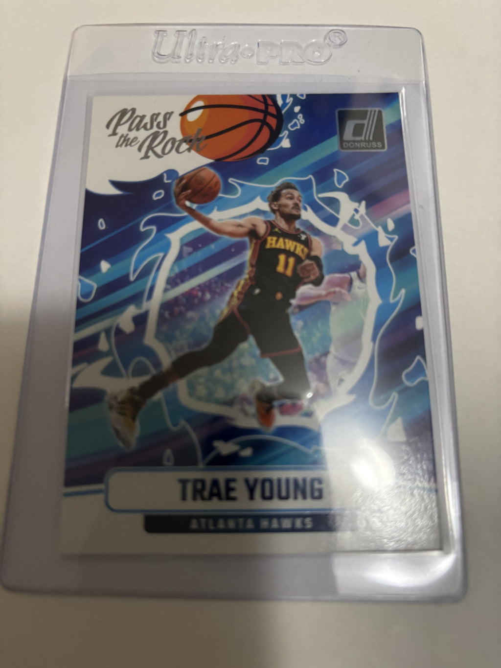 2024-25 Panini Donruss Trae Young Pass The Rock #9 Atlanta Hawks