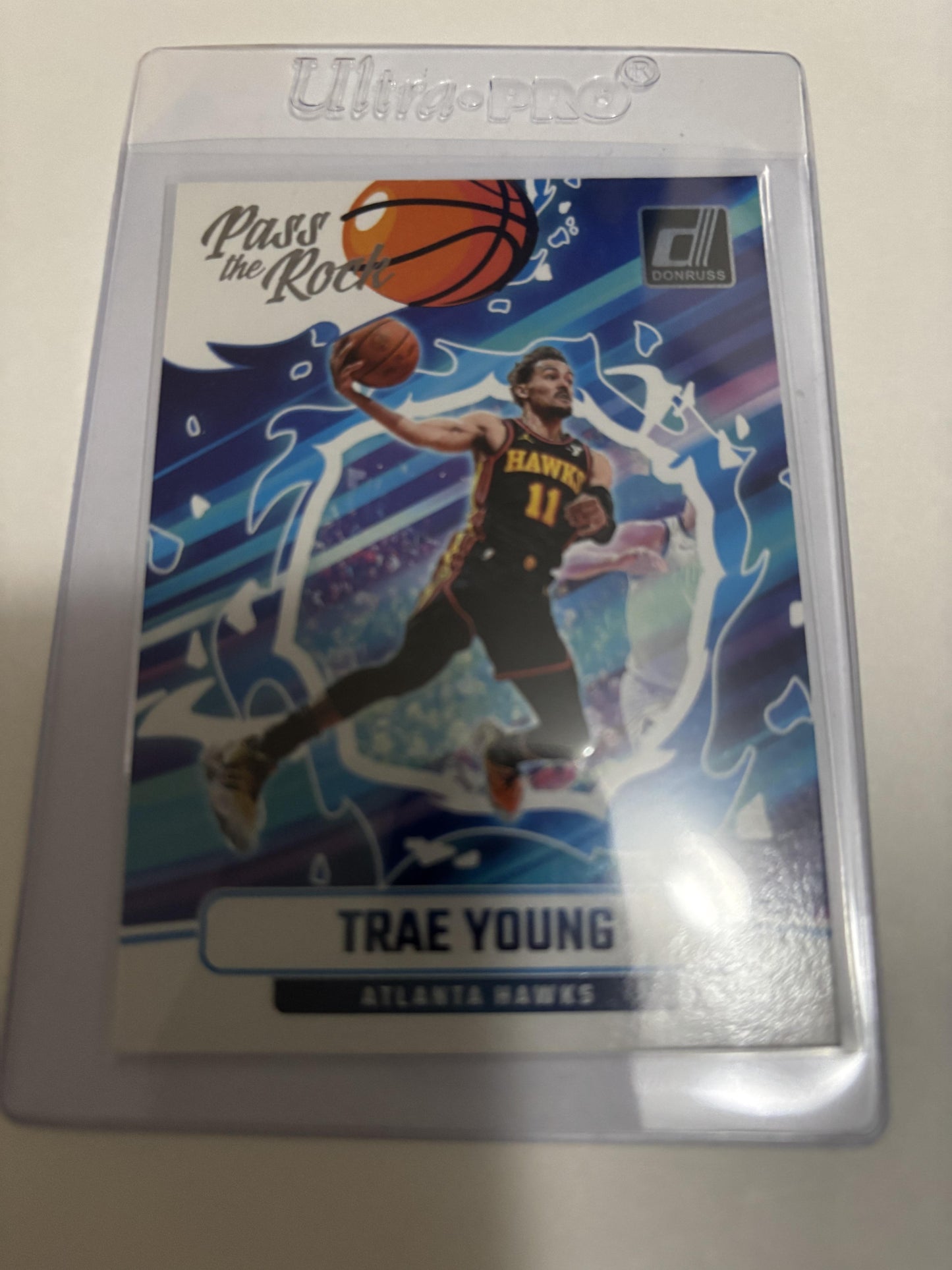 2024-25 Panini Donruss Trae Young Pass The Rock #9 Atlanta Hawks