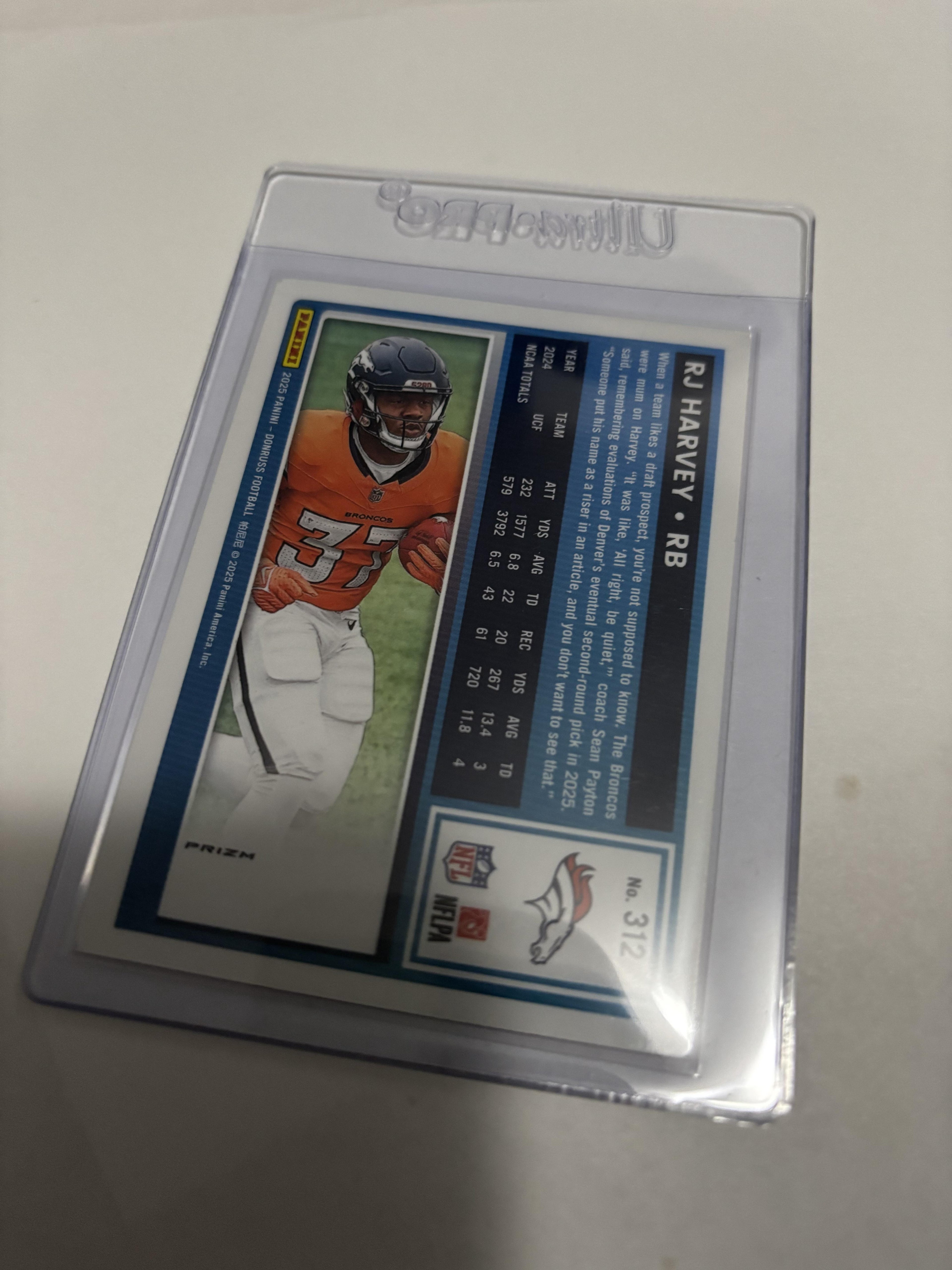 2025 Donruss Optic RJ Harvey Rated Rookie PINK VELOCITY Prizm #312 RC Broncos