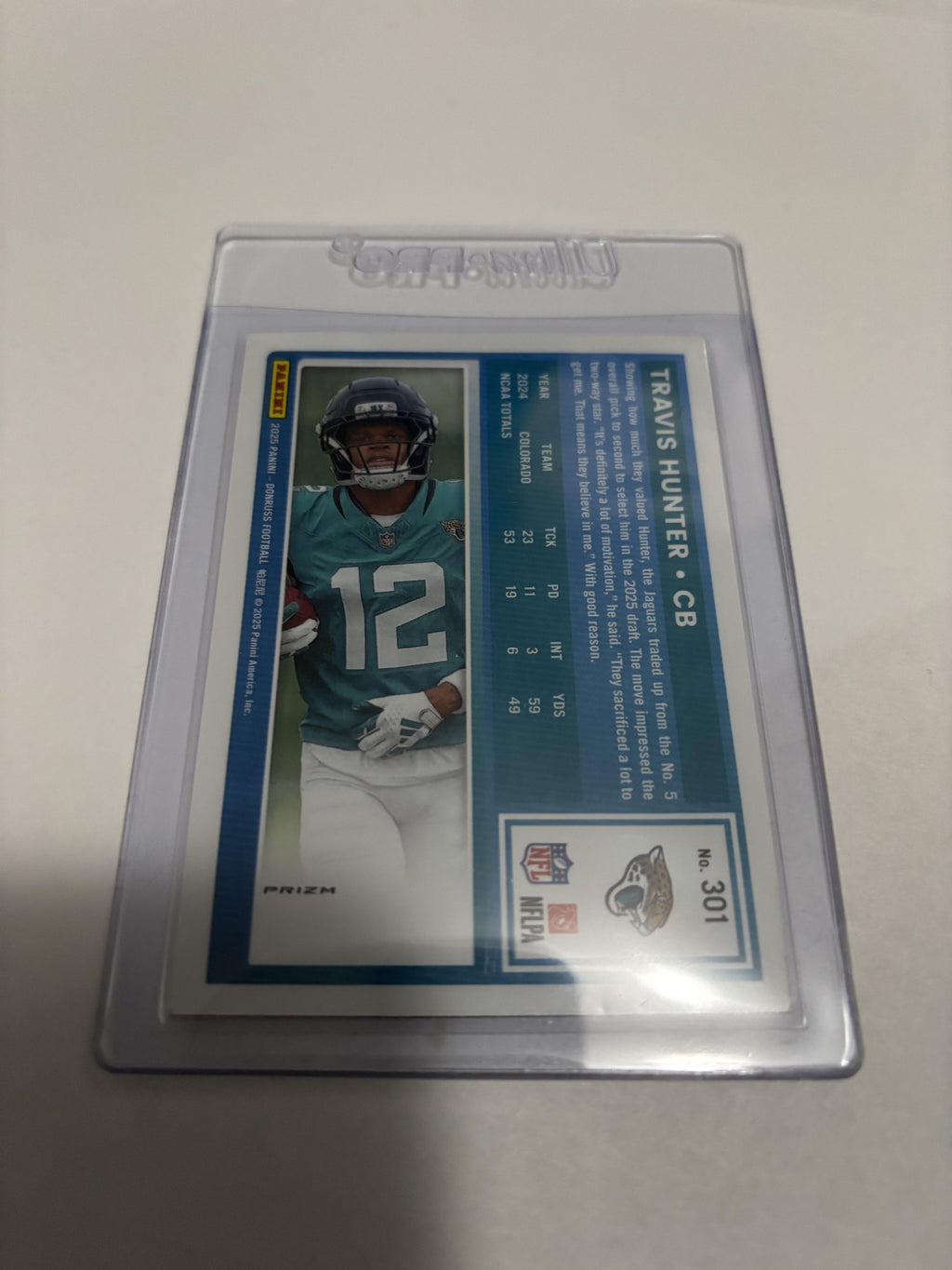 2025 Donruss Optic Travis Hunter Rated Rookie Red Velocity Prizm #301 RC Jags