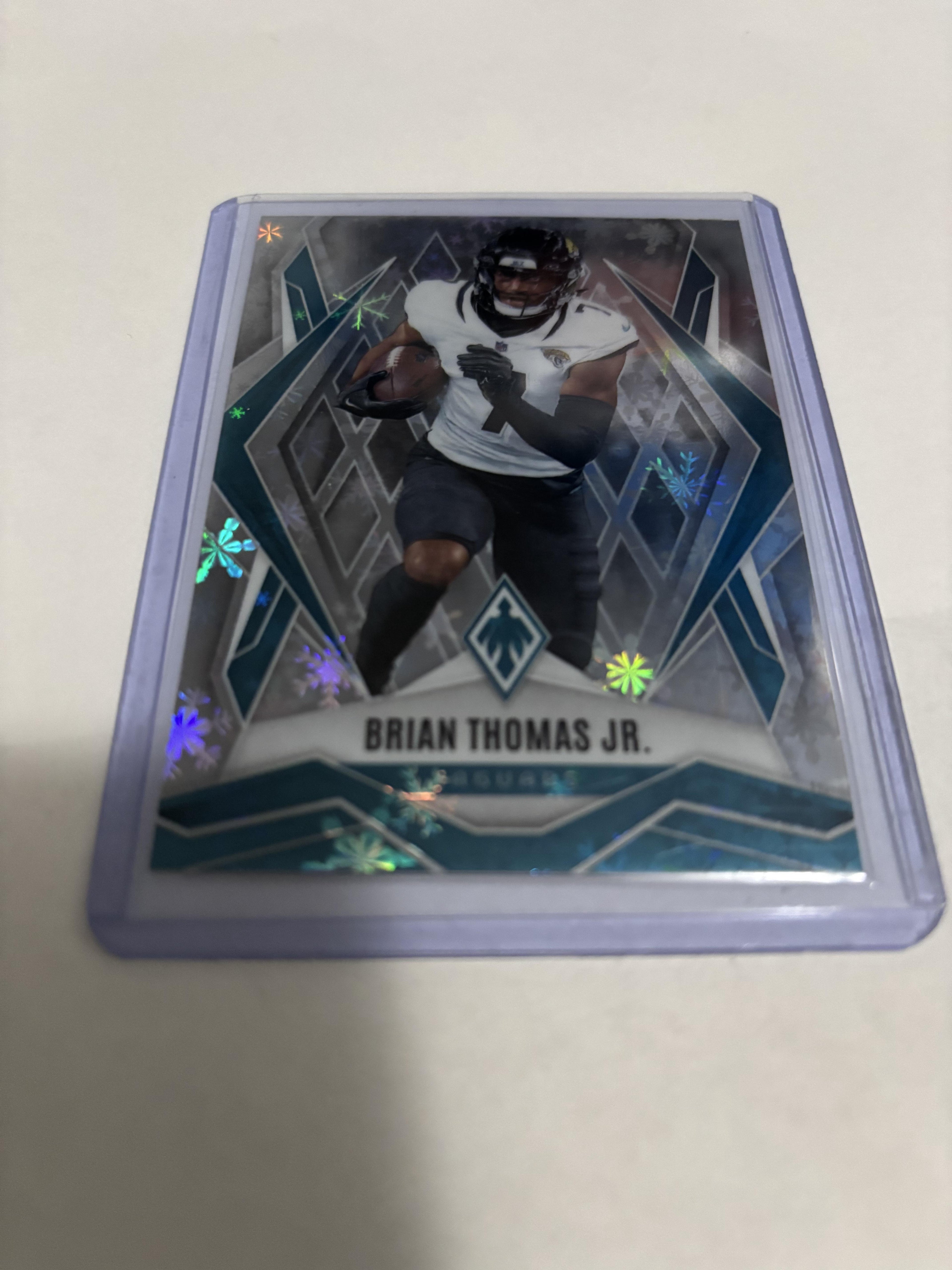 2025 Panini Phoenix Brian Thomas Jr. #99 Snowflake Parallel Jaguars