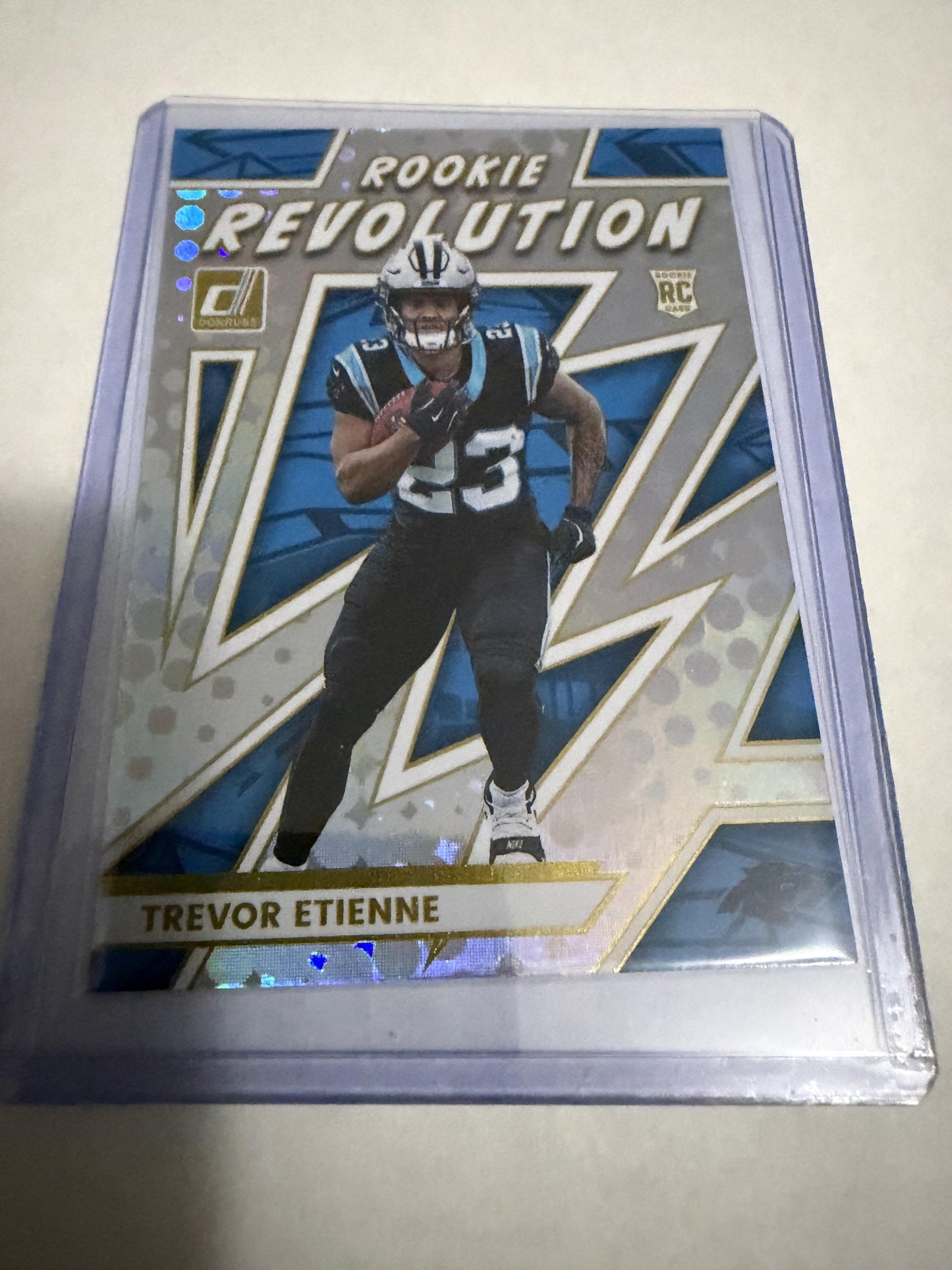 2025 Donruss Trevor Etienne Rookie Revolution Blue Prizm RC #28 Panthers