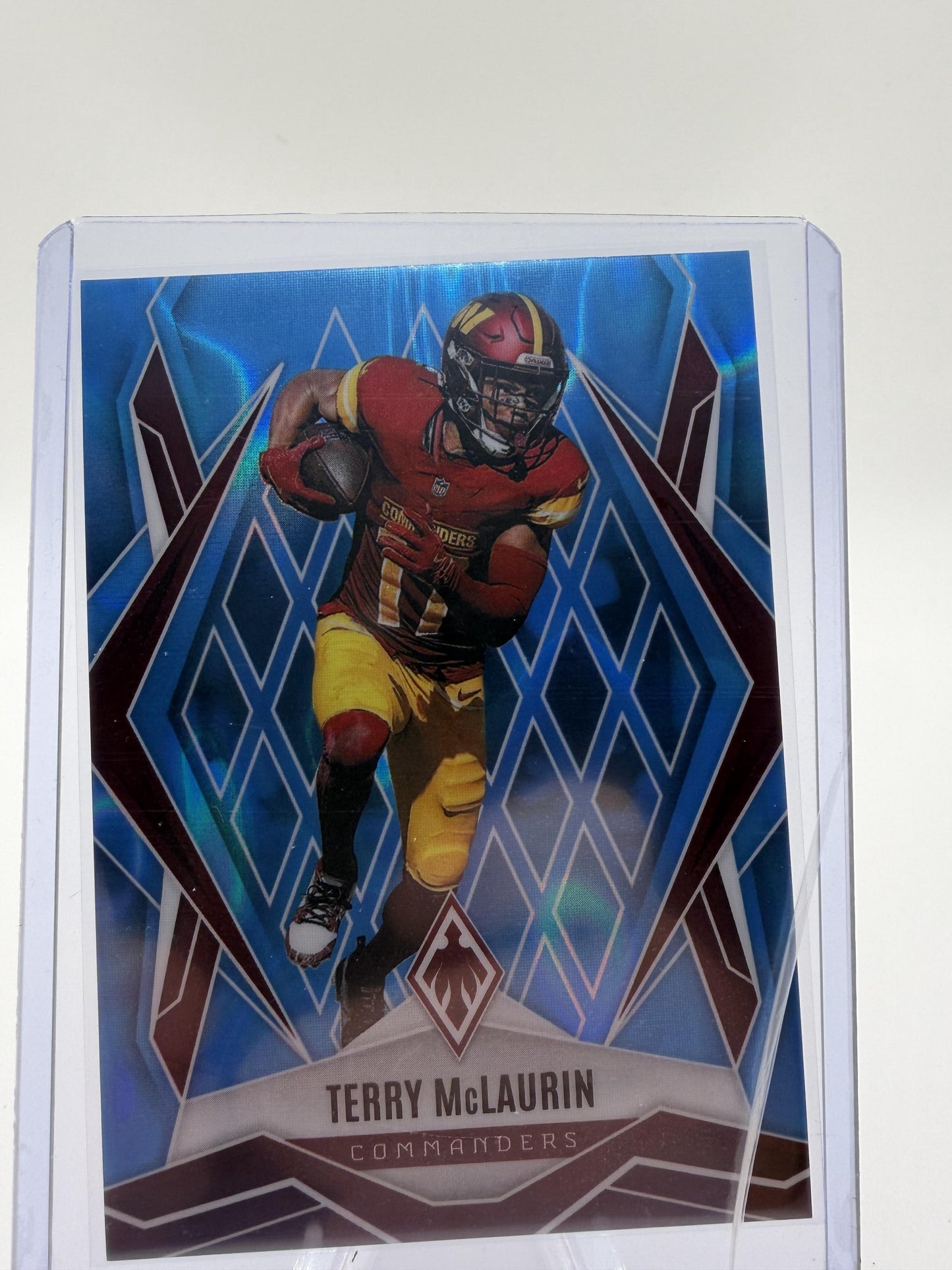 2025 Panini Phoenix Terry McLaurin Blue Diamond Prizm Card /325 Commanders #57
