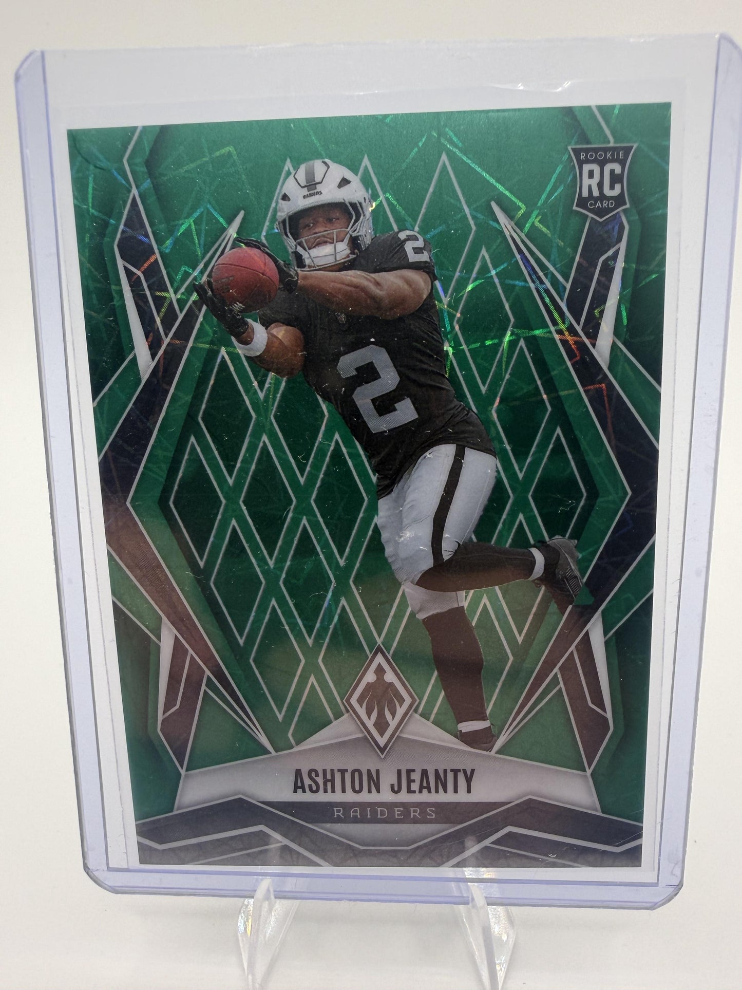2025 Panini Phoenix Ashton Jeanty Green Lazer Parallel /49 Raiders Card #158