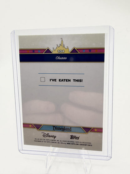 2025 Topps Disneyland 70th  Churro #104 Purple Glitter Foil Parallel