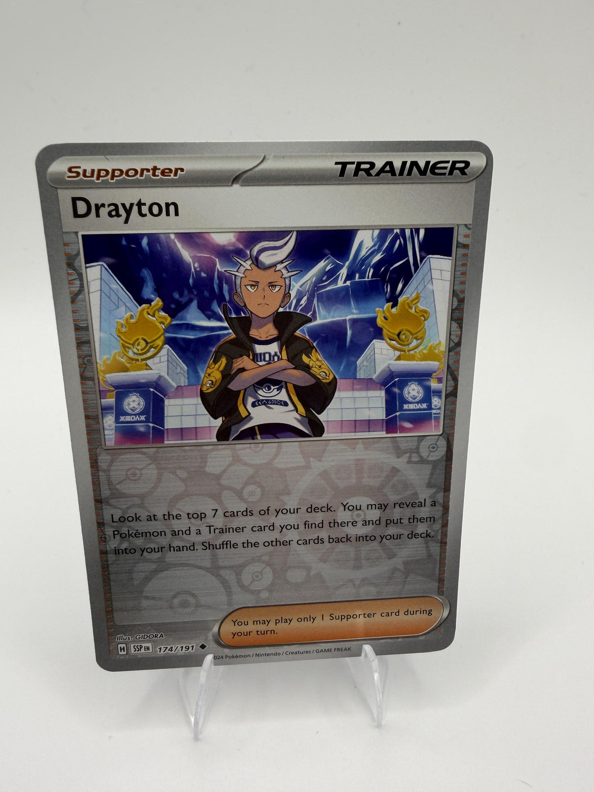 2024 Pokemon Drayton 174/191 Surging Sparks Reverse Holo Supporter Trainer NM