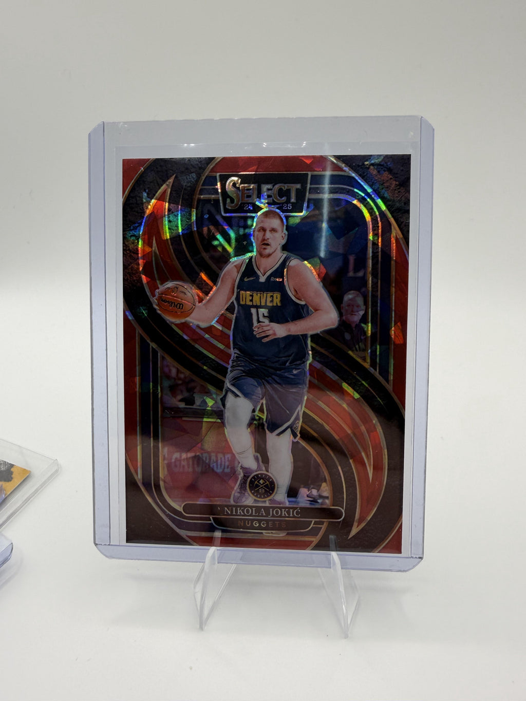 2024-25 Panini Select Nikola Jokić Red Cracked Ice Prizm Premier Level #140